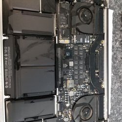 Synergies Tech - Liquid damage Macbook we repaired.