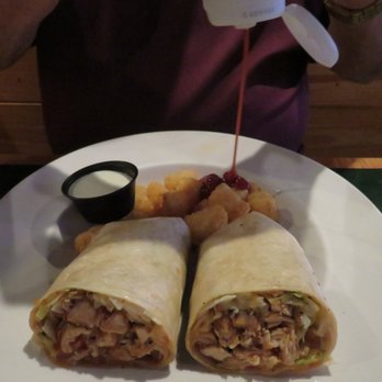 Gator's Dockside Ocala - Tom's Winger wrap, tator tots side and a stream of ketchup captured by my camera - American Near Me - Ocala, Florida