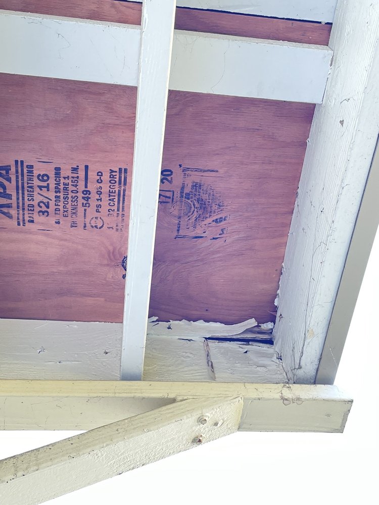 Slide of Caruzo's Roofing Contractors