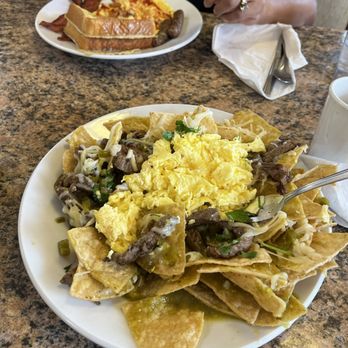 American Pancake House - This is what he calls chilaquiles from store bought chips - Breakfast & Brunch Near Me - South Bend, Indiana American Pancake House - This is what he calls chilaquiles from store bought chips - Breakfast & Brunch Near Me - South Bend, Indiana