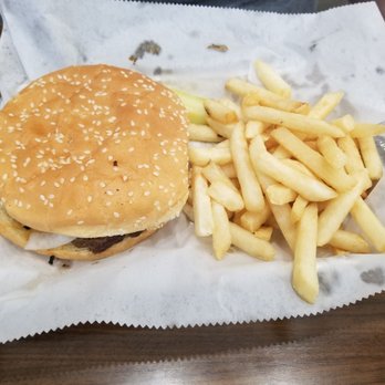 North Point Grill And Bar - My wife hamburger with under cooked frozen fries. - Pizza Near Me - Kawkawlin, Michigan
