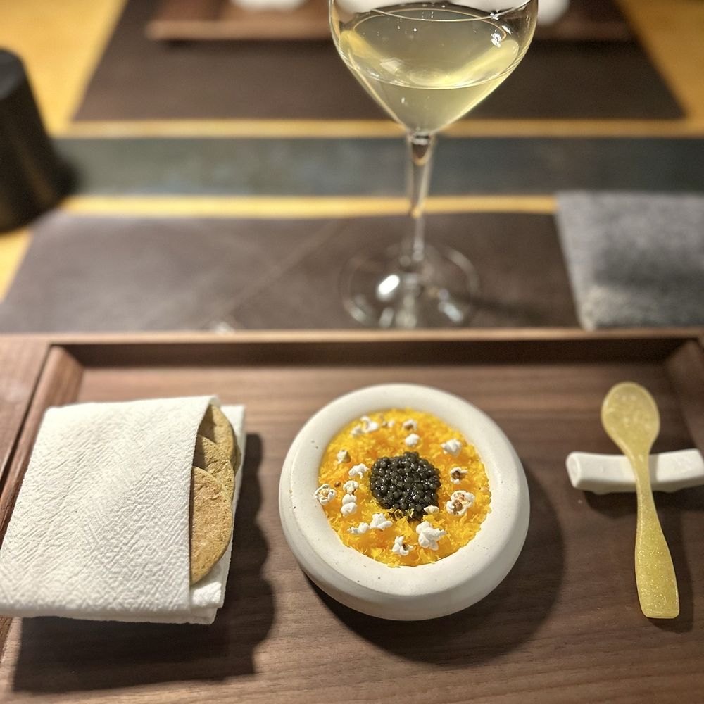 2nd course: caviar, creme fraiche on thin, soft masa crackers paired with their Vesper 2nd course: caviar, creme fraiche on thin, soft masa crackers paired with their Vesper