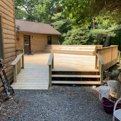 SkyLine Renovations & Remodeling - Finished with handicap accessible ramp, large steps, and 28' of benches for large parties!