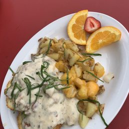 Gravy biscuit and "home fries" Gravy biscuit and "home fries"