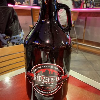 Red Zeppelin Pizza - Growler filled with Miller Lite - Pizza Near Me - Baton Rouge, Louisiana Red Zeppelin Pizza - Growler filled with Miller Lite - Pizza Near Me - Baton Rouge, Louisiana