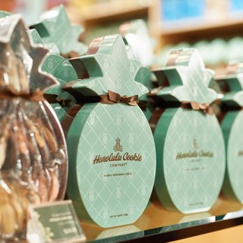 Honolulu Cookie Company - Enjoy a delicious treat of premium shortbread cookies collected in our signature Pineapple Shape Box (Ultimate Collection). - Bakeries Near Me - Wailea, Hawaii Honolulu Cookie Company - Enjoy a delicious treat of premium shortbread cookies collected in our signature Pineapple Shape Box (Ultimate Collection). - Bakeries Near Me - Wailea, Hawaii