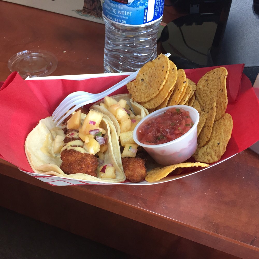 Taco Mondo - Mahi mahi tacos with a side of chips and salsa - Food Trucks Near Me - Philadelphia, Pennsylvania Taco Mondo - Mahi mahi tacos with a side of chips and salsa - Food Trucks Near Me - Philadelphia, Pennsylvania
