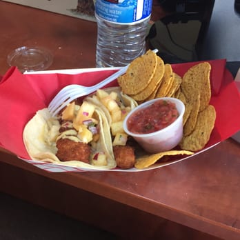Taco Mondo - Mahi mahi tacos with a side of chips and salsa - Food Trucks Near Me - Philadelphia, Pennsylvania Taco Mondo - Mahi mahi tacos with a side of chips and salsa - Food Trucks Near Me - Philadelphia, Pennsylvania