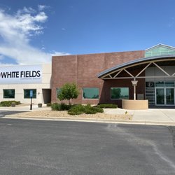 White Fields Community Church - Front of building with entrance below the sign