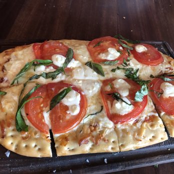 STIRR - club style cracker crust flatbread. - Cocktail Bars Near Me - Dallas, Texas STIRR - club style cracker crust flatbread. - Cocktail Bars Near Me - Dallas, Texas