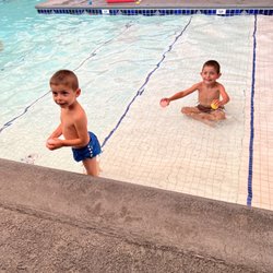 Callan Swim School - Pacific Beach - My boys hanging out on the steps before class! They LOVE getting to play in the area until it's their turn.