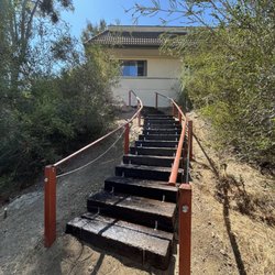 Sanderling Waldorf School - Stairs down to their HUGE playgrounds.