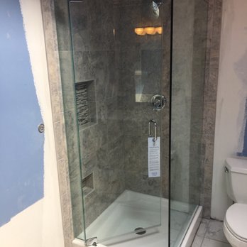 Reflections In Glass - 3/8" frameless shower door with 1/2" panels. Chrome header on top installed for support - Glass & Mirrors Near Me - Wauconda, Illinois