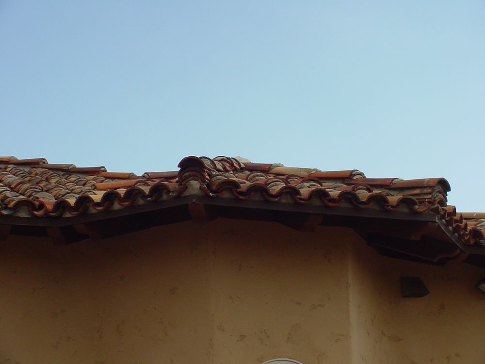 Slide of Valencia Roofing Company