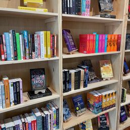 a bookshelf full of books a bookshelf full of books