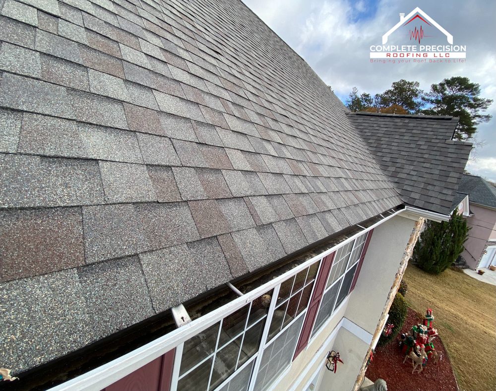 Slide of Complete Precision Roofing