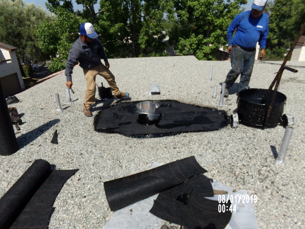 Slide of Tom Byer Roofing Service