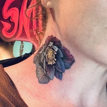 Black Lotus Tattoo - Black hellebore neck tattoo by Julien - Tattoo Near Me - Eugene, Oregon