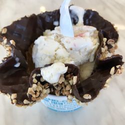 Amaretto with almonds in a peanut bowl