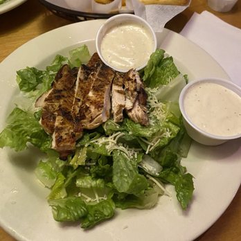Texas Roadhouse - Outstanding Caesar salad with juicy chicken. Appreciate the dressing on the side so I can decide how much I want to put! - Steakhouses Near Me - Durham, North Carolina
