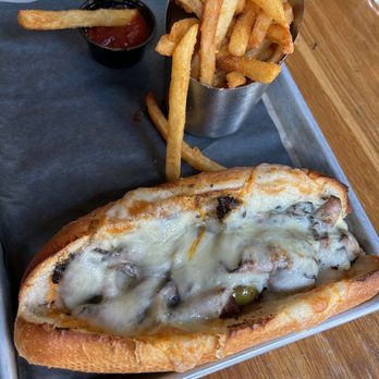 Trillium Brewing - Fort Point - Hot pastrami sandwich with cherry peppers, Russian dressing, and munster cheese on a demi baguette - Breweries Near Me - Boston, Massachusetts