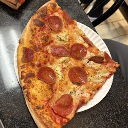 "one" slice of pepperoni pizza