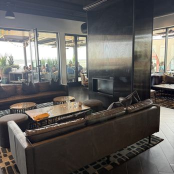 Luna Rooftop Bar - Some of the seating inside. - Cocktail Bars Near Me - Portland, Maine Luna Rooftop Bar - Some of the seating inside. - Cocktail Bars Near Me - Portland, Maine