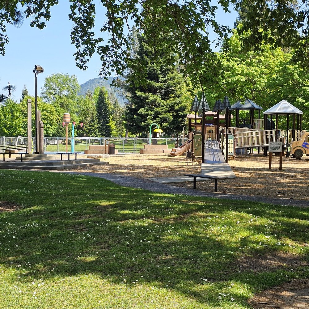 Riverside Park - Children's play area with water area showing. - Parks Near Me - Grants Pass, Oregon Riverside Park - Children's play area with water area showing. - Parks Near Me - Grants Pass, Oregon
