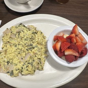 Café Croissant - Scrambled eggs with turkey, spinach, and onion and a side of fruit - Bakeries Near Me - Miami, Florida Café Croissant - Scrambled eggs with turkey, spinach, and onion and a side of fruit - Bakeries Near Me - Miami, Florida