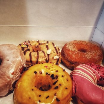 Dough - Glazed, cinnamon sugar, passion fruit, white chocolate raspberry, peanut butter chocolate. Cost $19 - Donuts Near Me - New York, New York