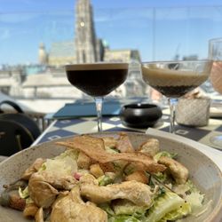 SKY Bar at STEFFL - Caesar salad with chicken and Lucky Bastard cocktail.