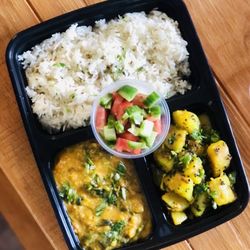 Ginger And Turmeric Indian Kitchen - Rice, Daal (Lentils), Aloo (Potatoes). Kachoombar (Salad)
