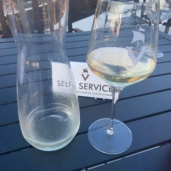 Vinland Winery - Carafe of wine with their stem glass. - Wineries Near Me - Fort Wayne, Indiana Vinland Winery - Carafe of wine with their stem glass. - Wineries Near Me - Fort Wayne, Indiana