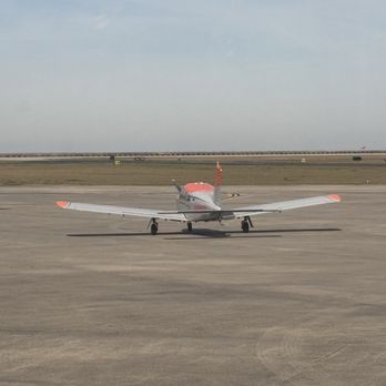 Messina's Runway Cafe - Plane view from dining area - Breakfast & Brunch Near Me - New Orleans, Louisiana