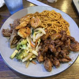 Steak chicken and shrimp hibachi with yakisoba noodles. Steak chicken and shrimp hibachi with yakisoba noodles.