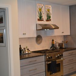 Home & Office Cabinetry of Delaware - Custom stained glass doors were brought into this kitchen design from the owners previous home