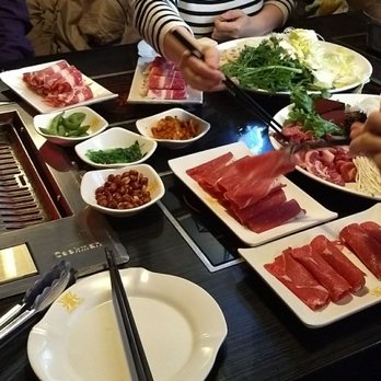 Nine Ting - Pictured are BBQ grill (left) and hotpot ingredients (right). - Korean Near Me - Philadelphia, Pennsylvania Nine Ting - Pictured are BBQ grill (left) and hotpot ingredients (right). - Korean Near Me - Philadelphia, Pennsylvania