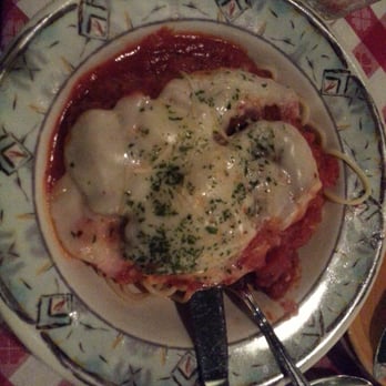 Melo Trattoria - Chicken parmigiano over spaghetti. - Italian Near Me - Durham, North Carolina