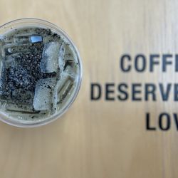 Black Sea Tea Latte, with oat milk, black sesame, hojicha tea, and ginger salt. A unique and tasty mix of flavors