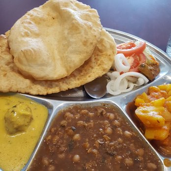 Pushap - Thali - choley bhature, kadi, aloo - Indian Near Me - Montreal, Quebec Pushap - Thali - choley bhature, kadi, aloo - Indian Near Me - Montreal, Quebec
