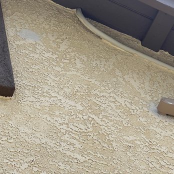 Sunrun - Extra hole that was drilled in the fresh stucco that was supposed to get touched up. Has not - Solar Installation Near Me