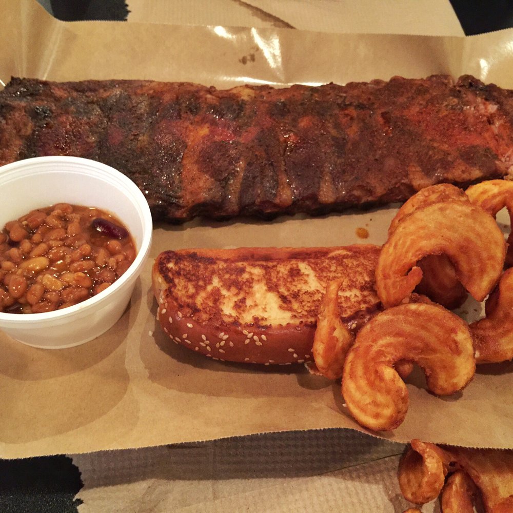 T's BBQ - Rack of ribs, BBQ baked beans and fries. - Barbeque Near Me - Harrison, Arkansas T's BBQ - Rack of ribs, BBQ baked beans and fries. - Barbeque Near Me - Harrison, Arkansas