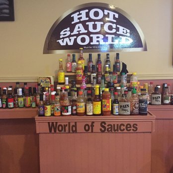 Tulips American Grub and Pub - Wall of hot sauce. - Pubs Near Me - Johnson City, Tennessee Tulips American Grub and Pub - Wall of hot sauce. - Pubs Near Me - Johnson City, Tennessee