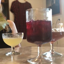 Nostalgia Room - L-R: gimlet, dry wine-based cocktail, champinion dreams canned cocktail (poured to a glass)
