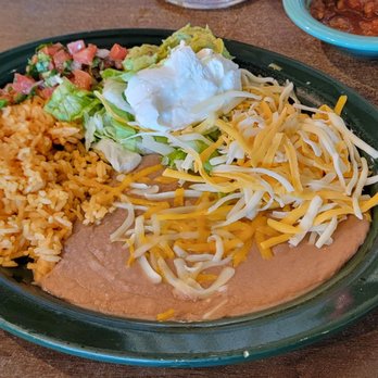 Mi México Lindo - Side plate of rice, beans salsa guacamole and cheese - Mexican Near Me - Lincoln, Nebraska Mi México Lindo - Side plate of rice, beans salsa guacamole and cheese - Mexican Near Me - Lincoln, Nebraska