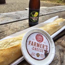 Hot baguette and beer from two fish, cheese from another place