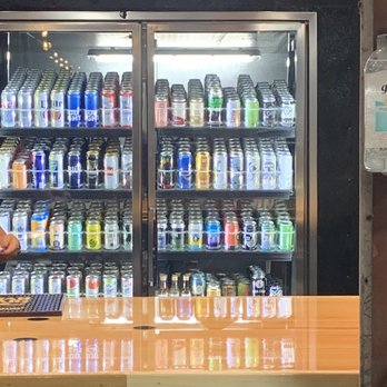 The Fowling Warehouse Indianapolis - Fridge with huge selection of beer and ciders - Sports Bars Near Me - Indianapolis, Indiana