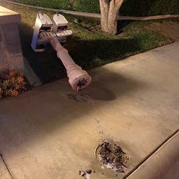 Knocked over and broken mailbox Knocked over and broken mailbox