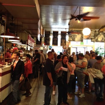 Faidley's Seafood - Crowd is getting started for lunch! Get here early and get a standup table if u can find one..! - Seafood Markets Near Me - Baltimore, Maryland Faidley's Seafood - Crowd is getting started for lunch! Get here early and get a standup table if u can find one..! - Seafood Markets Near Me - Baltimore, Maryland