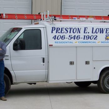 Preston E. Lowe Electric - a man standing in front of a utility truck - Electricians Near Me Preston E. Lowe Electric - a man standing in front of a utility truck - Electricians Near Me